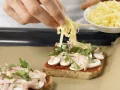 Baked Ham & Mushroom Pizza Toasts preparation step 6 Baked Ham & Mushroom Pizza Toasts preparation step 6