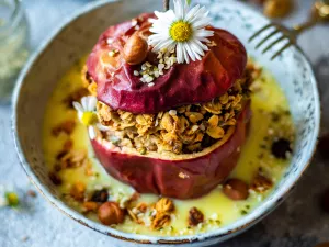 Baked Apples with Vanilla Sauce and Oat Filling Baked Apples with Vanilla Sauce and Oat Filling in a bowl