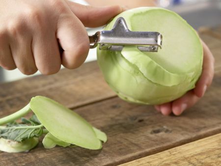 Raw Kohlrabi preparation step 1 Raw Kohlrabi preparation step 1
