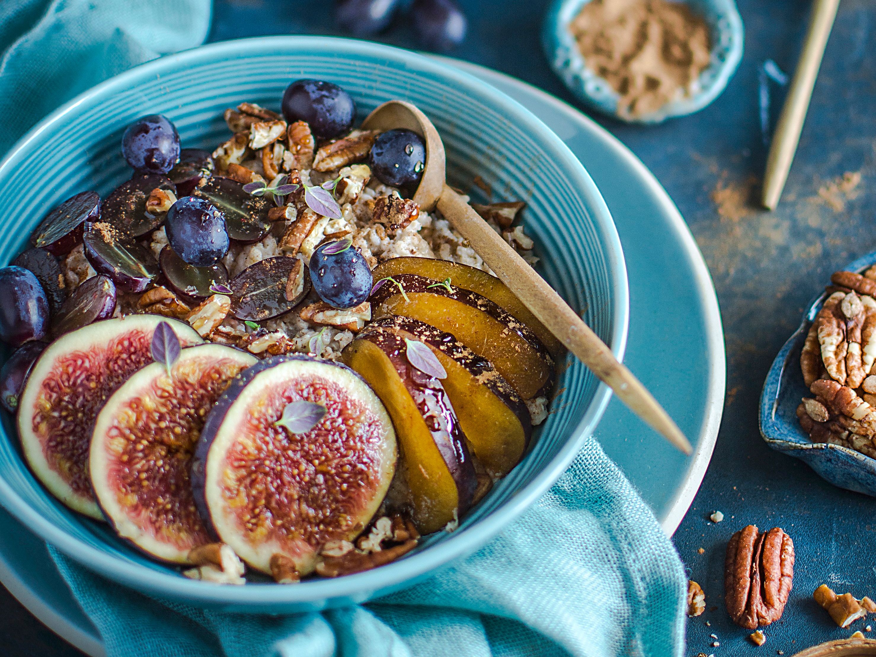 Oatmeal with figs, plums and pecans-image